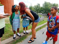 1009397793 ma nb HayMacFistDay  Andrea Fairbairn gives granddaughter Keyana DeRosa, 6, a kiss as she prepares to enter the school for the first day of school at the Hayden McFadden Elementary School in New Bedford.  PETER PEREIRA/THE STANDARD-TIMES/SCMG : education, school, students